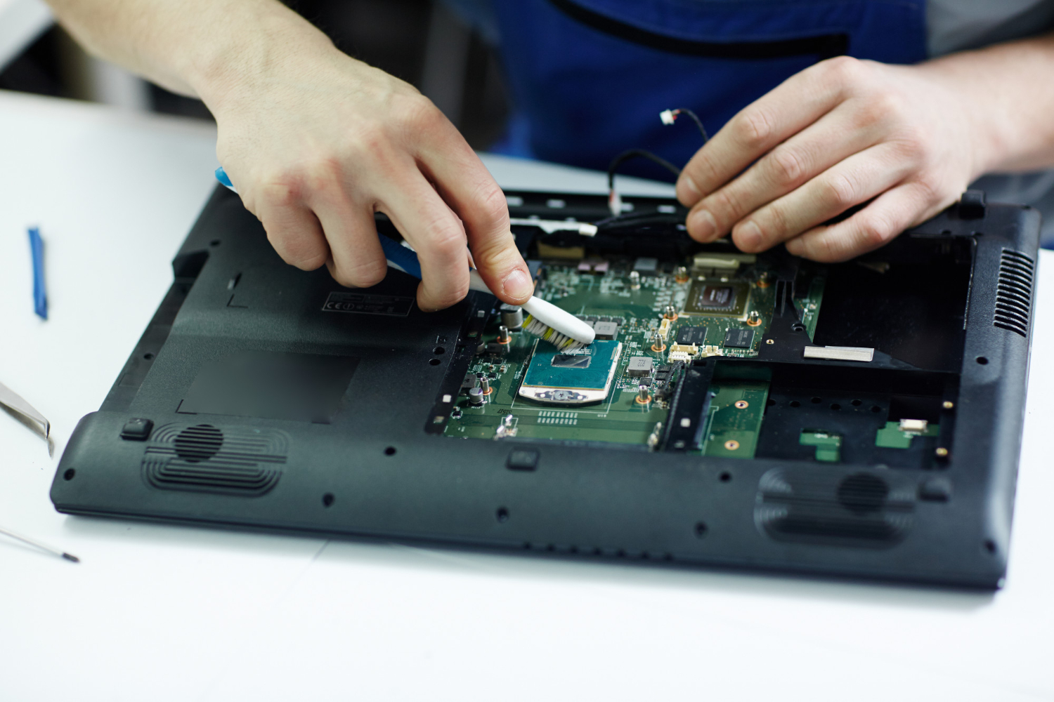 Technician working on a laptop